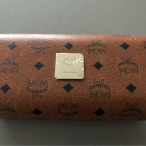 MCM monogram cognac hard shell glass case